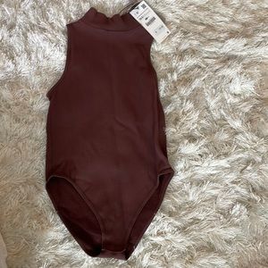Brown ribbed mock neck bodysuit
